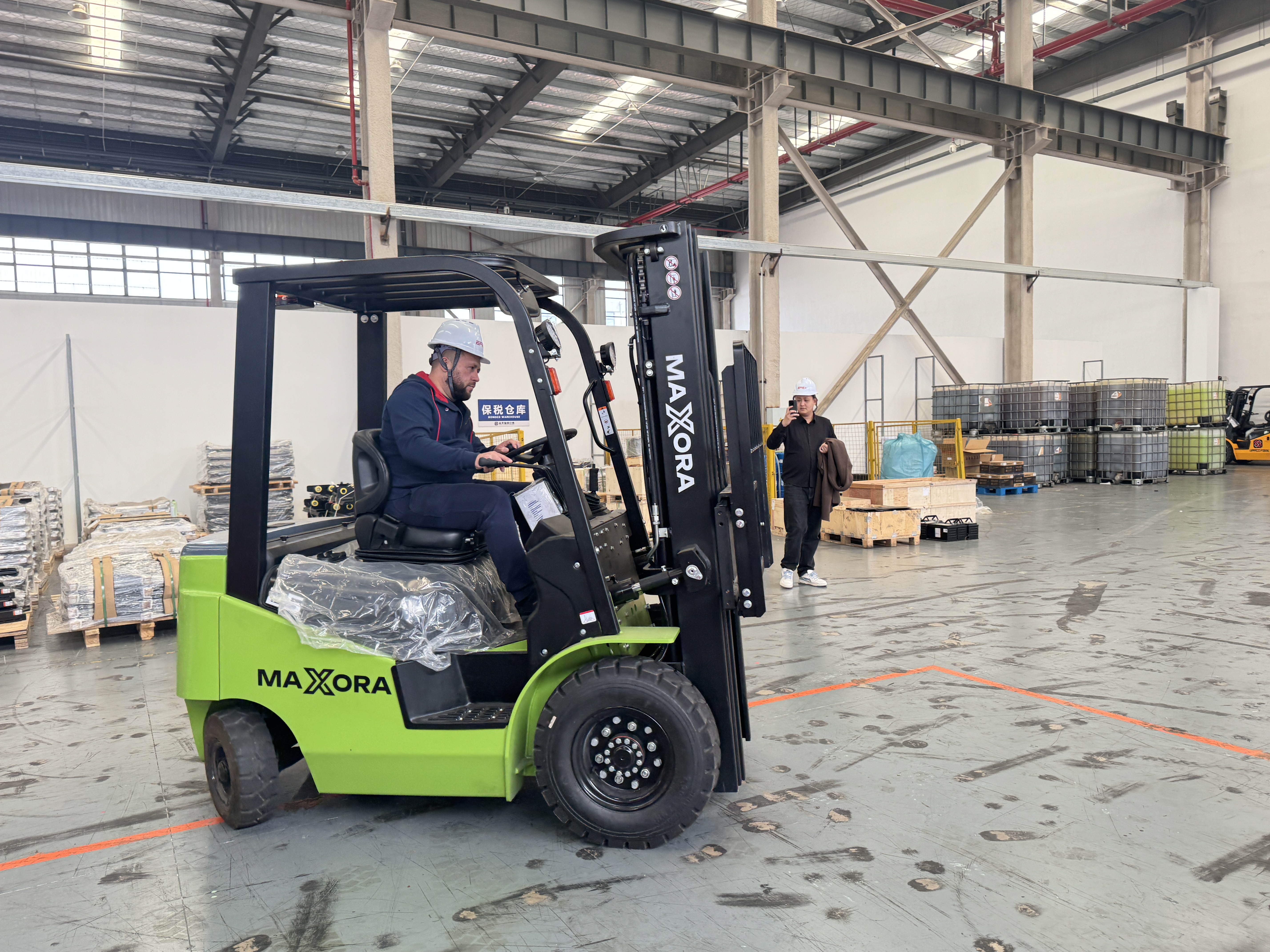 A Handshake Across Oceans:  Overseas Dealer Denis Signs Partnership